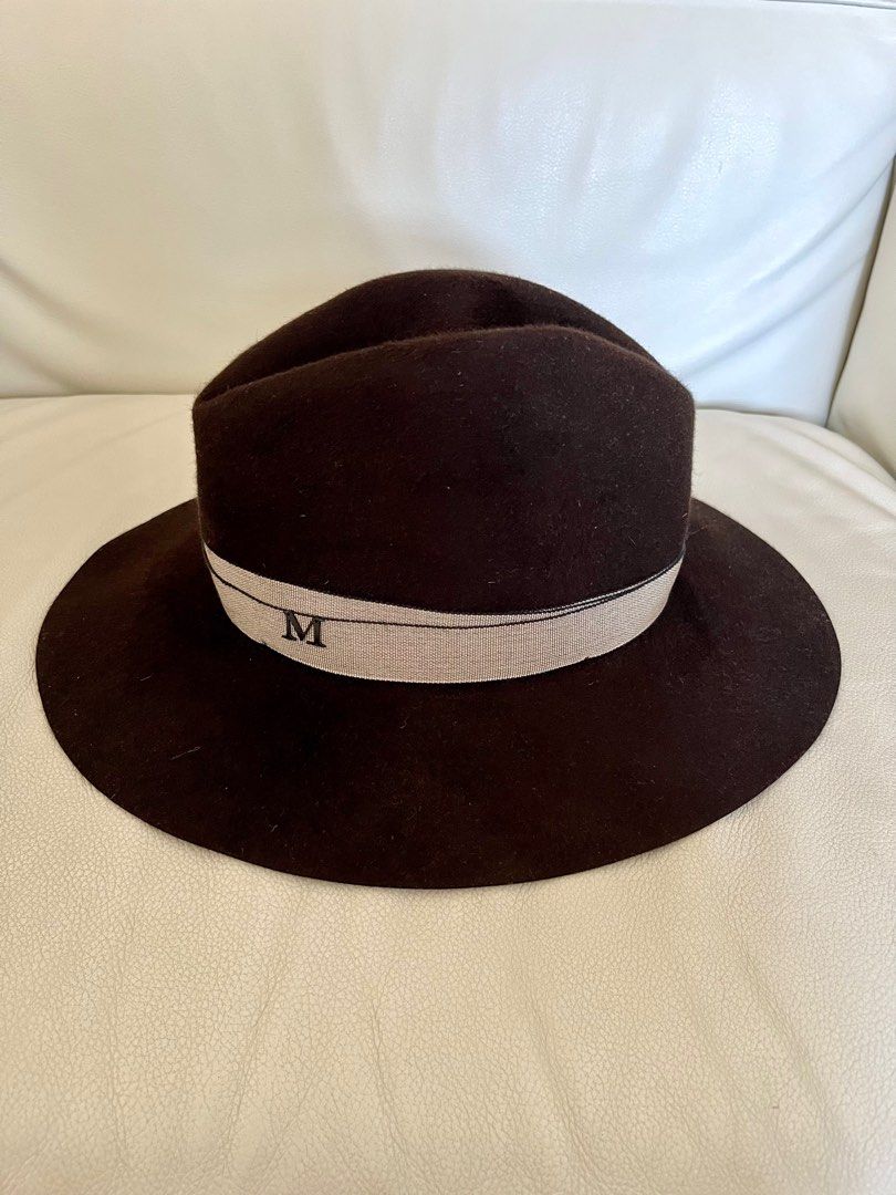MAISON MICHEL PARIS Ladies Felt Brown Fedora Hat sz S (Category: Hats & Beanies) located in Singapore. Submitted by mimmi75 (Listing ID 1376897664, Image 1). Description: Immerse yourself in timeless elegance with iconic Maison Michel felt hat collection, crafted from luxurious beaver fur felt. Only worn once. Purchased at OnPedder Takashimaya. Retail $1300 * Fedora * Beaver fur felt * Colour: Dark Brown * Made in France .