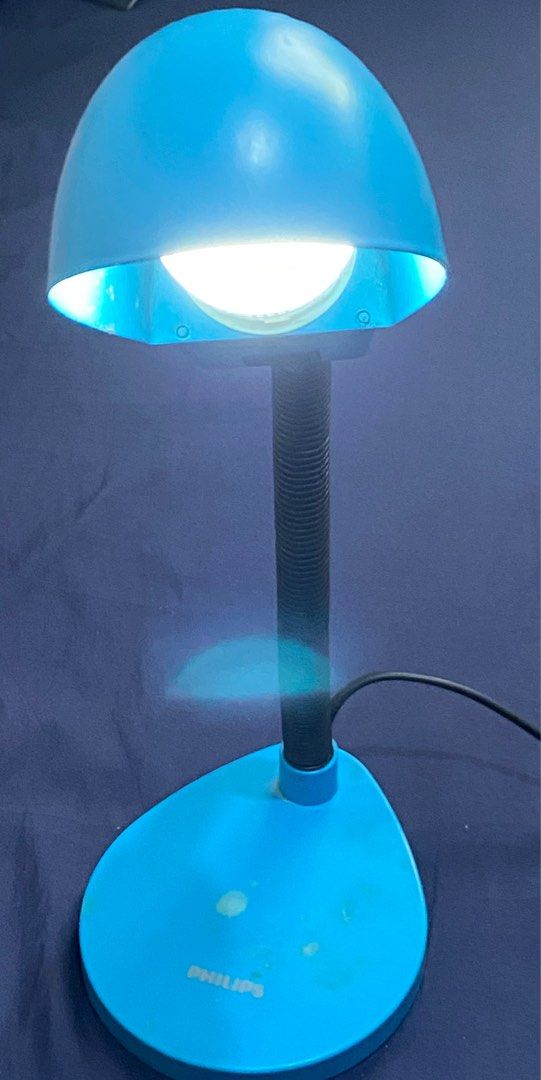Preloved Philips study lamp heavy duty (Category: Lighting) located in Quezon City. Submitted by hirono18 (Listing ID 1376868721, Image 1). Description: Preloved Philips study lamp Heavy duty With sign of usage and scratches Light bulb no issue Bulb replaceable with any preferred color Location: Novaliches QC Price: 130.