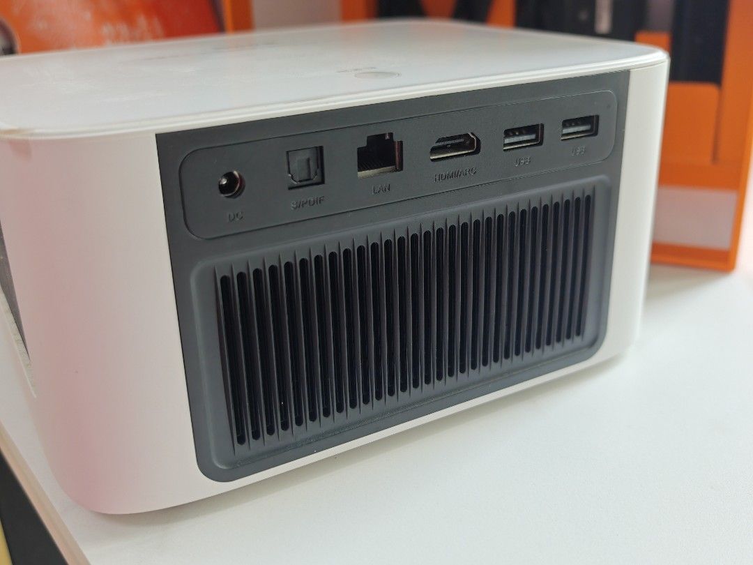 Projector Dangbei D3X 1080p 4k (Category: Projectors) located in Singapore. Submitted by tjuzmychem (Listing ID 1376842994, Image 3). Description: Dangbei D3X projector 1080p 4k compatible dimension 200*157*100 mm net weight 1.474 kg with package 3.09 kg with HDMI (ARC) USB 2.0 DC LAN WiFi 2.5G/5G 500CVIA lumin projecting size 30-300 inch auto-correction easy to focus *coming with FREE projection screen.