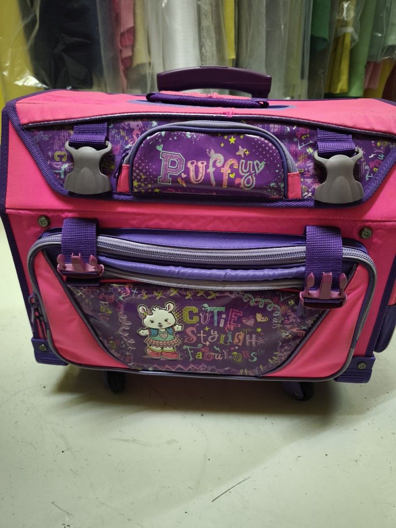 Puffy trolley bag (Category: Strollers) located in Las Pinas. Submitted by modelmama (Listing ID 1376932759, Image 1). Description: all in good condition. Wheels good and intact. All zippers are functioning well. Stroller handle mechanism good and pristine. Pls see photos for slight torn or stain on some areas - thus the cheaper price than usual. SF paid by the buyer via lalamove to be booked by the buyer. Pick up from Pamplona Tres, Las pinas ci