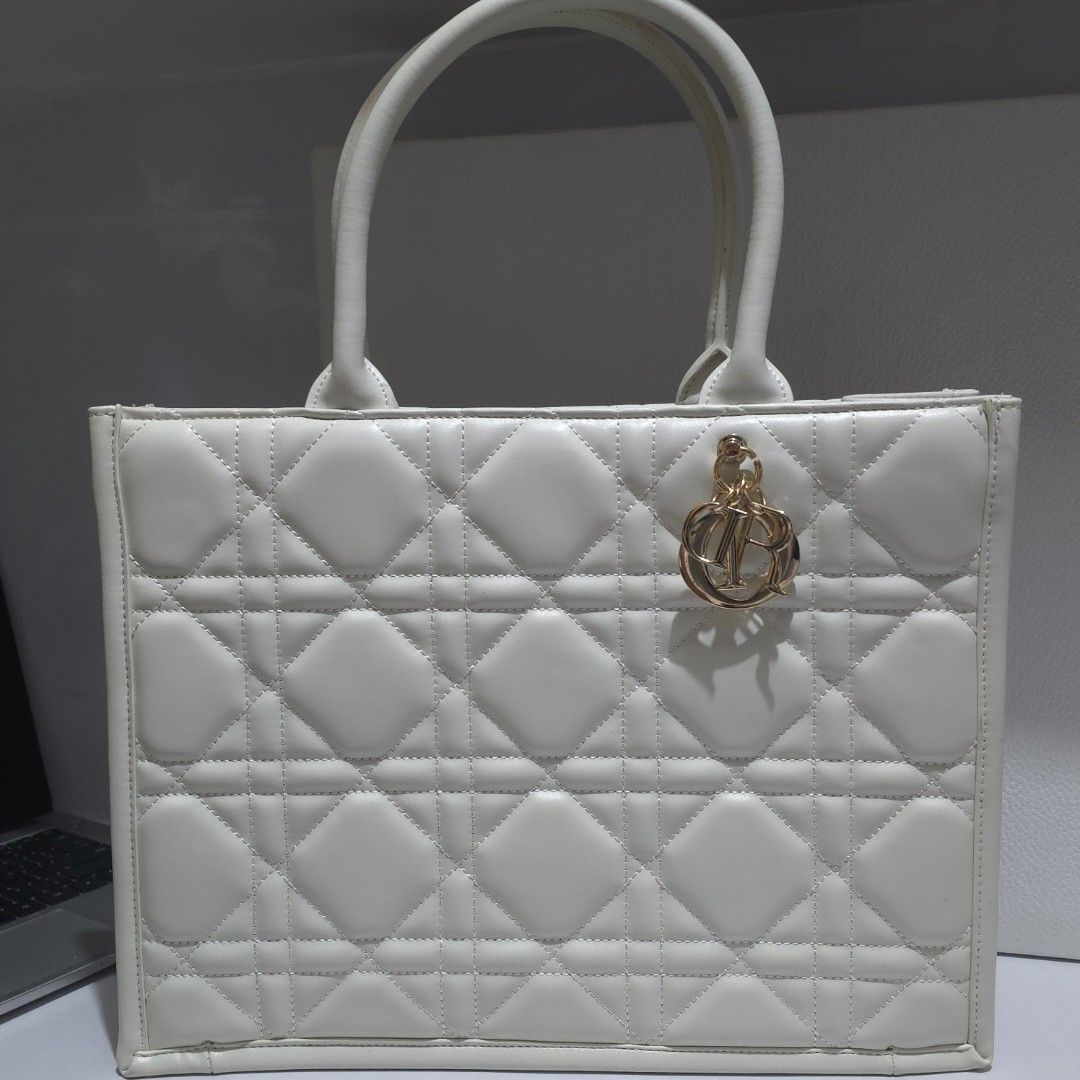 RUSH! Dior Book Tote Bag (Category: Luxury Bags & Wallets) located in Manila. Submitted by qzfxiyun (Listing ID 1377001979, Image 1). Description: dm for more info..