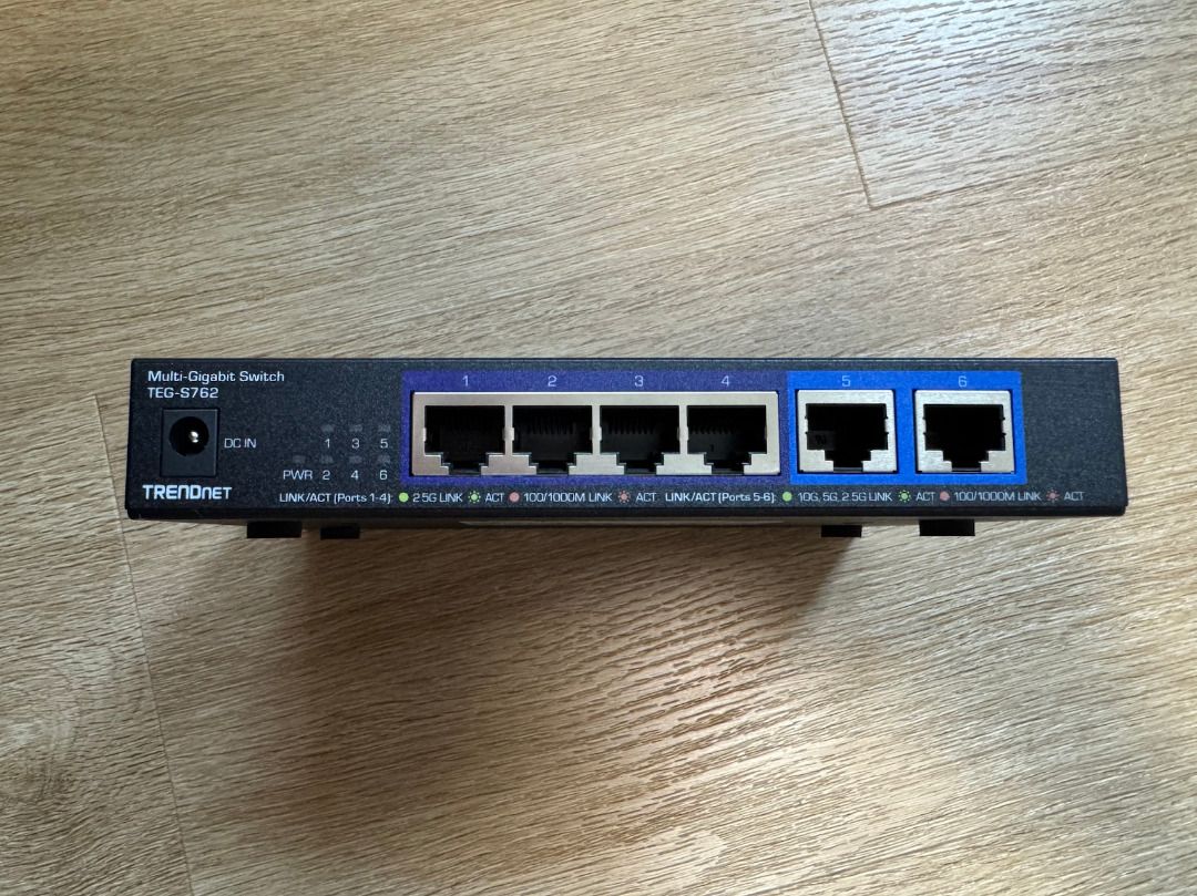 TRENDnet 6-Port 10G Switch 4x2.5G 2x10G RJ-45 Ports TEG-S762 (Category: Networking) located in Singapore. Submitted by airpay (Listing ID 1376852958, Image 2). Description: Condition very good. Comes with original power adapter - DEVICE INTERFACE: 4 x 2.5G RJ-45 ports; 2 x 10G RJ-45 ports. - 10G PORTS: This 6-Port 10G switch offers two 10G ports for high-speed network connections providing a cost-effective solution in adding 10G link capability. 