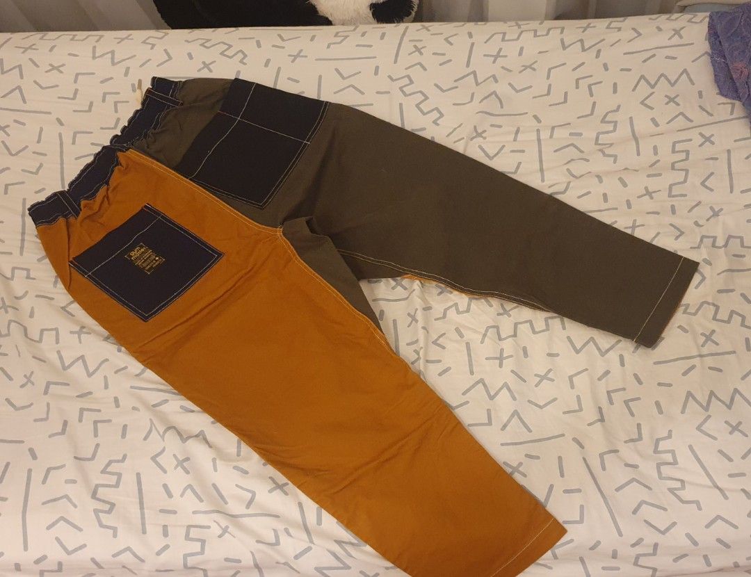 Two-Tone Patchwork Pants (Category: Other Bottoms) located in Singapore. Submitted by purplepars (Listing ID 1376966575, Image 2). Description: Two-tone design with unique patchwork. Elastic waistband 76cm unstretched. Bought in HK but too small for me so never worn. Meetup at Newton or at my convi.
