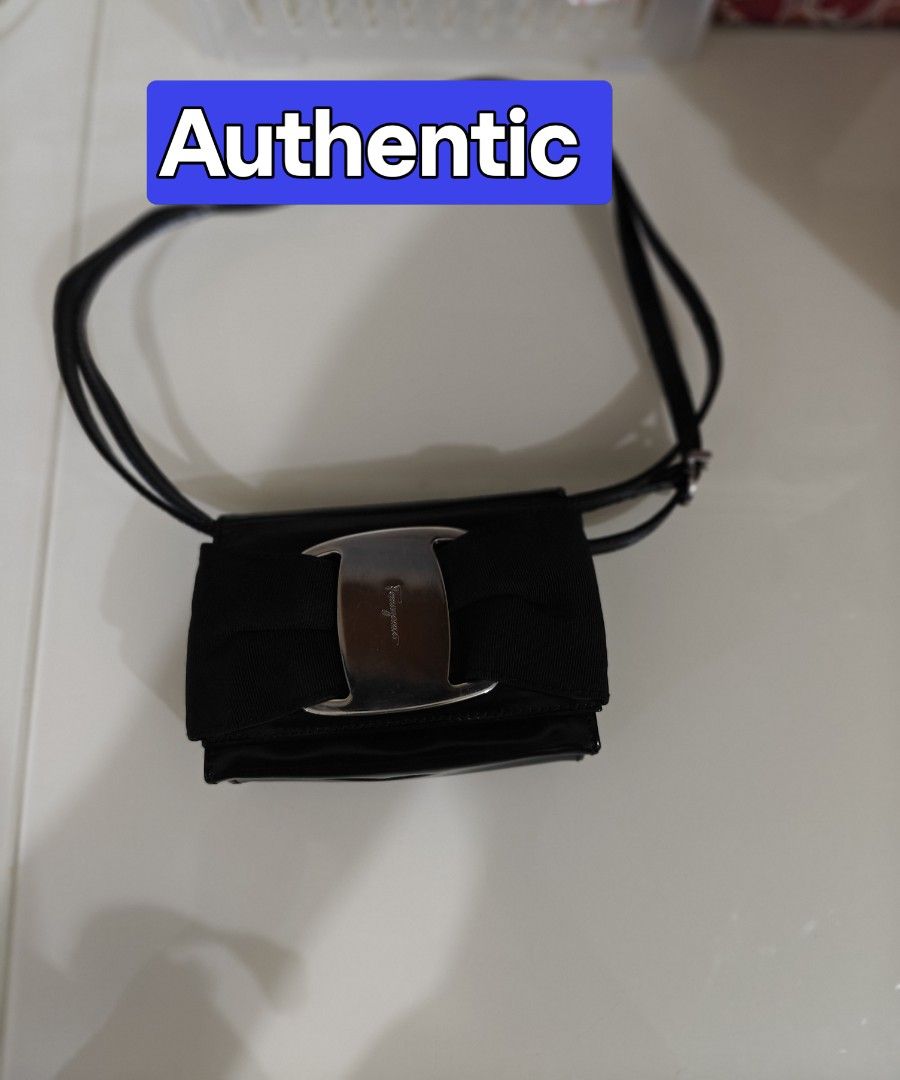 100%Authentic Super Cute MiNi Salvatore Ferragamo Patent Leather SlingBag Crossbody Vera/Ribbon Enamel Black Snap button POCHETTE,DimensionsH10cm L13cm W5cm Some white spots on the bag Which are the reflection of the camera light.It's in good condition (Category: Bags & Wallets) located in Singapore. Submitted by everygoodsgoodgoodauthentic (Listing ID 1370935833, Image 1). Description: Get Free Brand New Hat🤠 👉🏻There are no more photos and vi