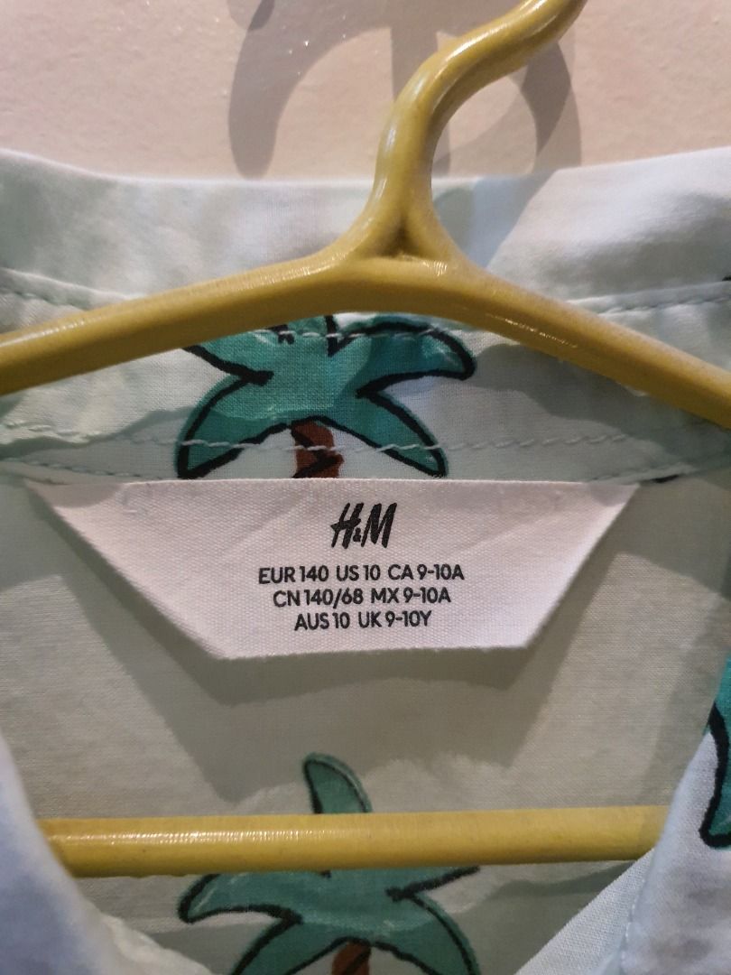 Hawaiian Inspired Polo Shirt (Category: Babies & Kids Fashion) located in Caloocan City. Submitted by forever_growing (Listing ID 1377140575, Image 2). Description: Lightly used t-shirt polo Brand: H&M Polo Size: 140 .