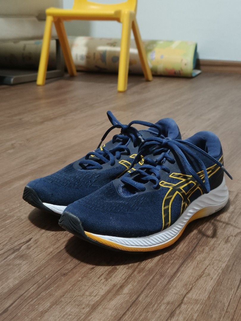 ( ✅ NEGO) Asics Running Shoes (7.5) #novablast, kayano (Category: Sneakers) located in Singapore. Submitted by garlic8 (Listing ID 1377133406, Image 3). Description: - Asics Gel-Excite 9, bought a few months ago and haven't used since - pictures are recent - Navy blue with yellow accents - US size 7.5 - Practically new, smells even better than it looks - You could run in it, jump around in it, heck you could fly with these - You gon be the flyest