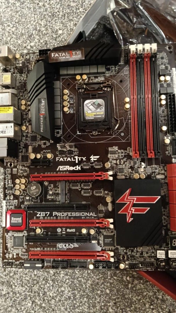 ASRock Fatal1ty Z87 Professional Motherboard (Category: Computer Parts) located in Singapore. Submitted by thanostone (Listing ID 1377042555, Image 2). Description: - ASRock Fatal1ty Z87 Professional Motherboard - Excellent condition - Includes original box and packaging almost new.never really use. fix prixe.