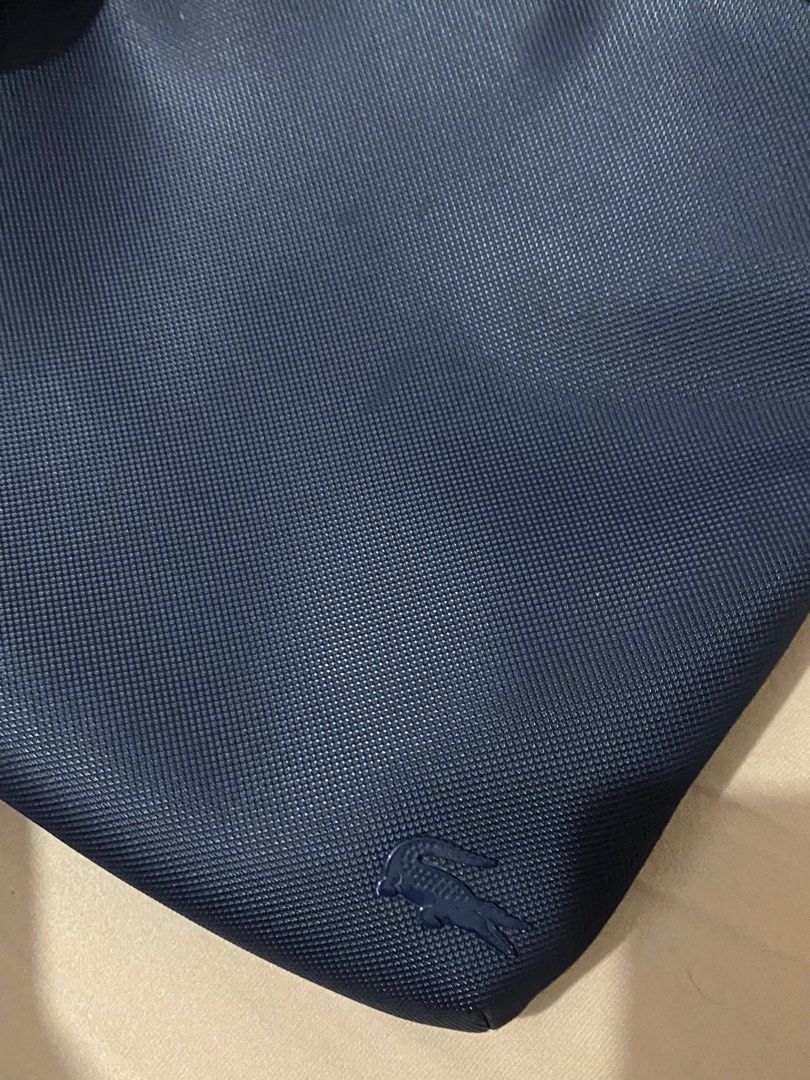 Authentic Lacoste Messenger Bag (Category: Sling Bags) located in Navotas City. Submitted by jaldeclutters (Listing ID 1377138917, Image 2). Description: minimal flaws (see photos).
