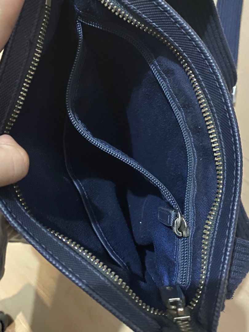 Authentic Lacoste Messenger Bag (Category: Sling Bags) located in Navotas City. Submitted by jaldeclutters (Listing ID 1377138917, Image 3). Description: minimal flaws (see photos).