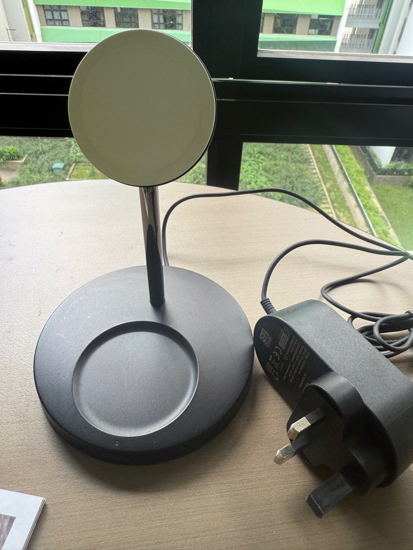 Belkin BOOST↑CHARGE PRO 2-in-1 Wireless Charger Stand (Category: Chargers & Cables) located in Singapore. Submitted by Cheesecakefan (Listing ID 1377091635, Image 2). Description: This Belkin BOOST↑CHARGE PRO 2-in-1 Wireless Charger Stand with MagSafe. It allows you to charge your iPhone and AirPods simultaneously. Comes with the original box and power adapter. Great for your desk or bedside table!.