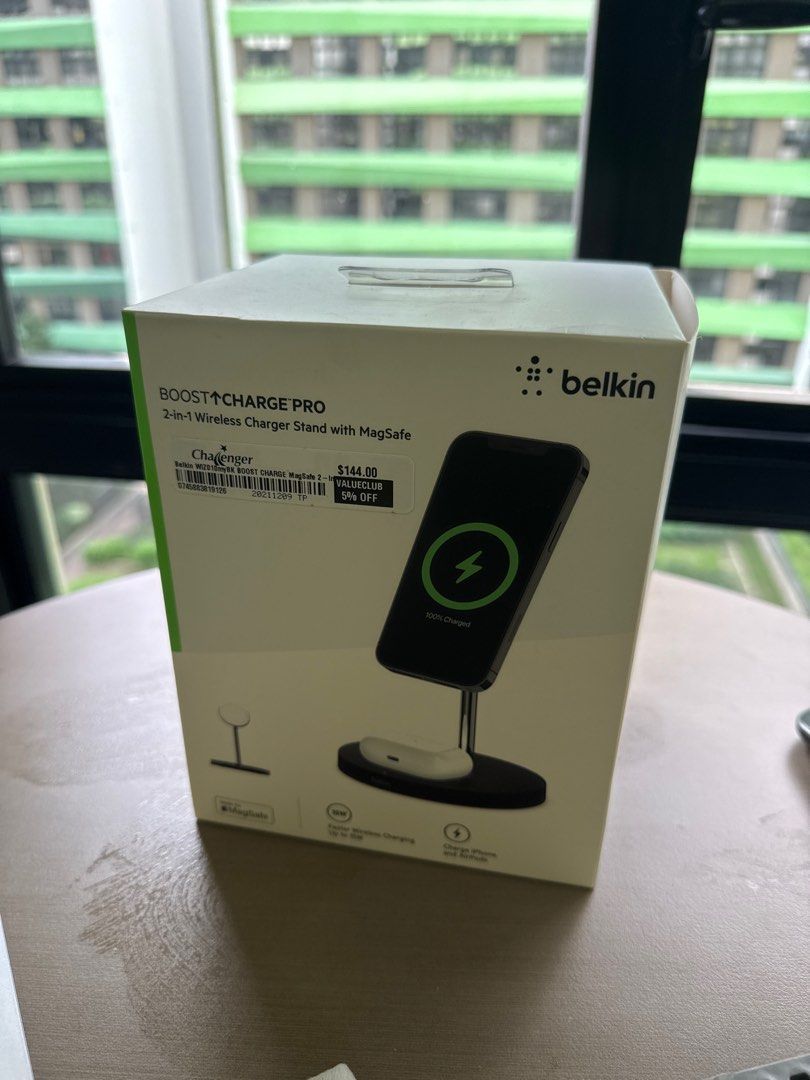 Belkin BOOST↑CHARGE PRO 2-in-1 Wireless Charger Stand (Category: Chargers & Cables) located in Singapore. Submitted by Cheesecakefan (Listing ID 1377091635, Image 1). Description: This Belkin BOOST↑CHARGE PRO 2-in-1 Wireless Charger Stand with MagSafe. It allows you to charge your iPhone and AirPods simultaneously. Comes with the original box and power adapter. Great for your desk or bedside table!.