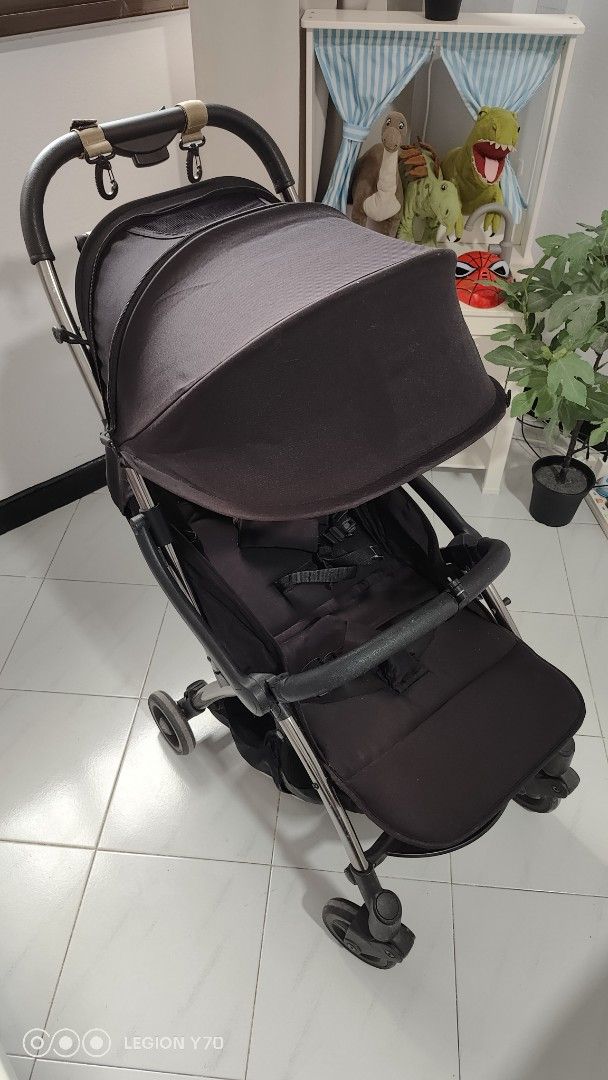 Black Stroller (Category: Strollers) located in Singapore. Submitted by 19unknown96 (Listing ID 1377147366, Image 1). Description: This stroller is in good condition. It features a sunshade and a comfortable seat. The frame appears to be made of metal. It has a compact design, making it easy to maneuver. Perfect for everyday use..