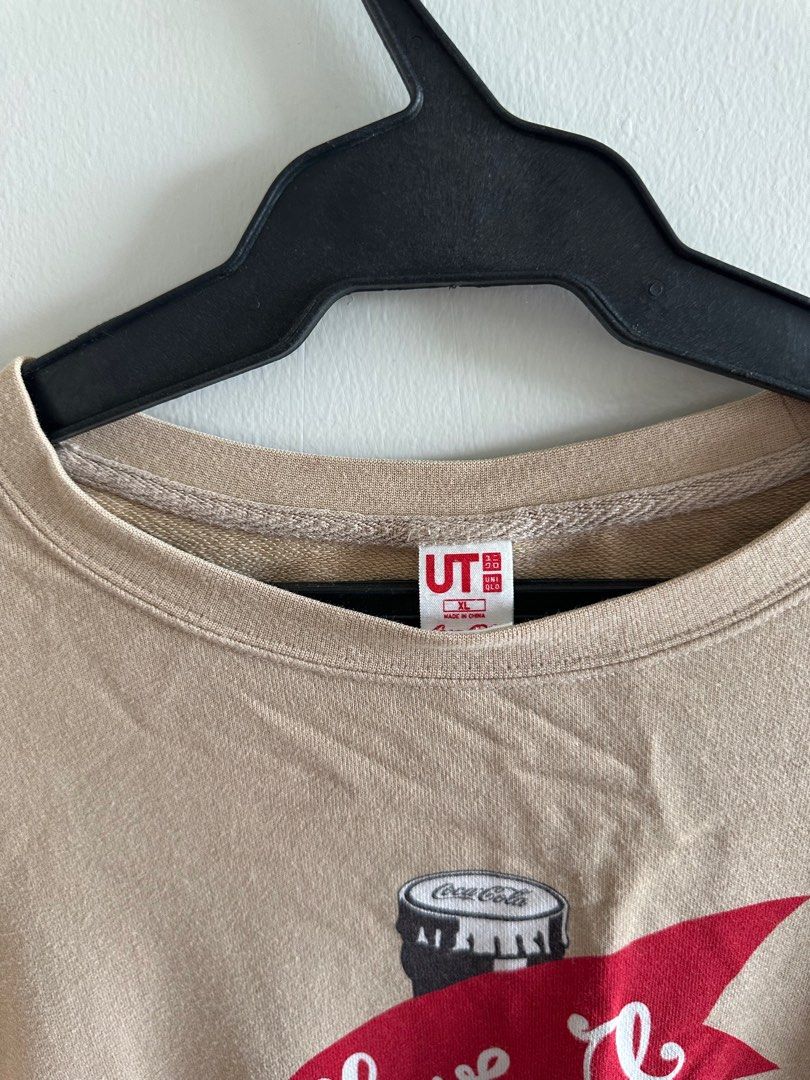 Brown Coca-Cola Sweatshirt (Uniqlo) (Category: Coats, Jackets and Outerwear) located in Quezon City. Submitted by washubi (Listing ID 1377146133, Image 2). Description: ⌞ dm for exact measurements ☻⌝ ➙ original uniqlo ➙ can fit XL ➙ condition is still okay ➙ MOD: SDD/SCO/JNT/GGX ➙ MOP: GCASH/BDO RFS: decluttering 📦.