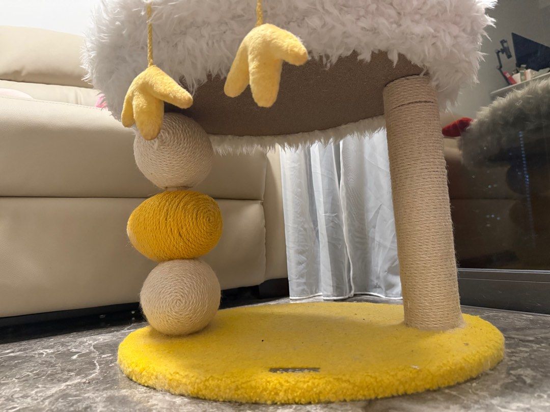Cat Tree Cat House Cute (Category: Homes & Other Pet Accessories) located in Singapore. Submitted by yzhang0072 (Listing ID 1377151167, Image 2). Description: Adorable chicken-shaped cat tree! Features a soft, fluffy bed for your cat to lounge in. Includes scratching posts and hanging toys for play. The base is a bright yellow, and the overall design is sure to be a fun addition to your home..