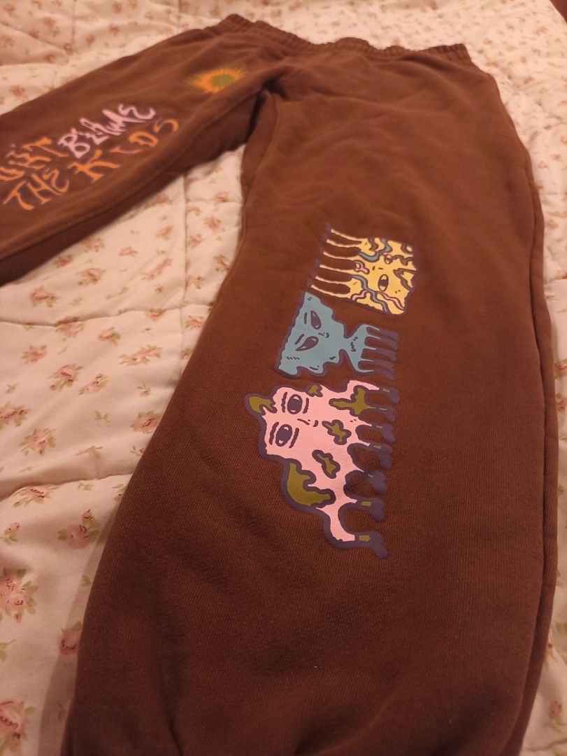 DBTK x Garapata x H&M (Category: Other Bottoms) located in Marikina City. Submitted by jrssags (Listing ID 1377048353, Image 2). Description: Art: Garapante by Garapata Collaboration: Garapata H&M DBTK - Don't Blame The Kids Color: Brown Heavy Cotton Length: 34.5 inches Waist Width (laid flat): 14 inches Waist & Hem: Garterized Condition: - Stitches: Very Good - Print: Very Good, No Fading (see photos) - Any fabric color fading is very minimal an