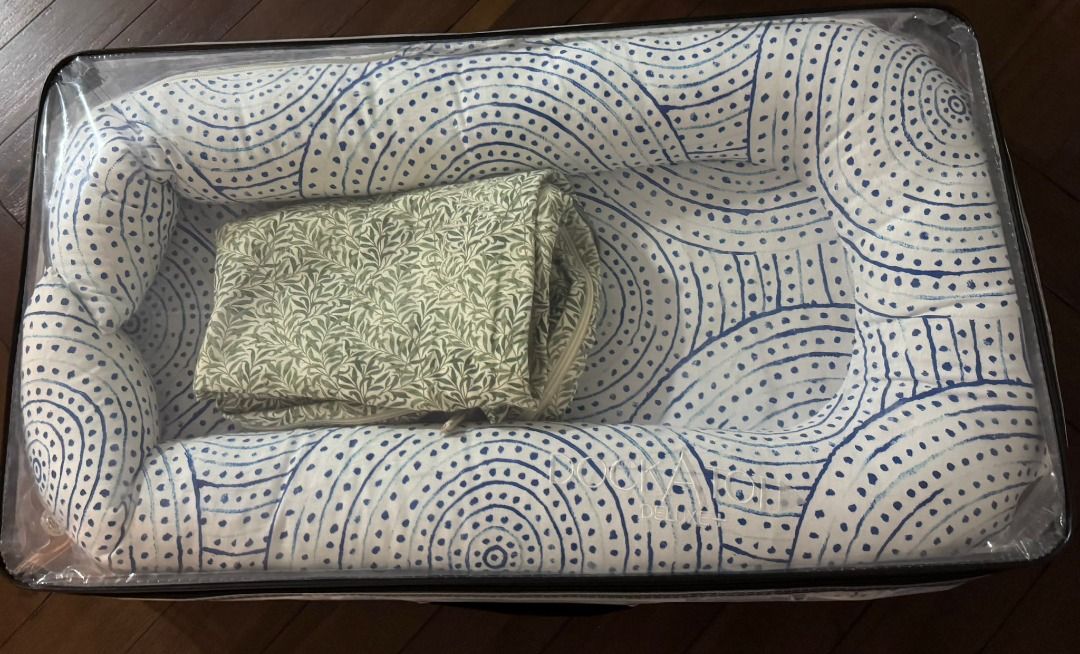DockATot Deluxe+ with Extra Cover – Like New | Baby Nest with extra Cover (Category: Cots & Cribs) located in Singapore. Submitted by nvettiger (Listing ID 1377147239, Image 1). Description: Hardly used and in excellent condition – almost like new. Suitable for babies from 0 to 8 months. This baby nest comes with a matching cover. The nest is designed with soft, comfortable material and a stylish blue and white pattern and an extra green cover. I