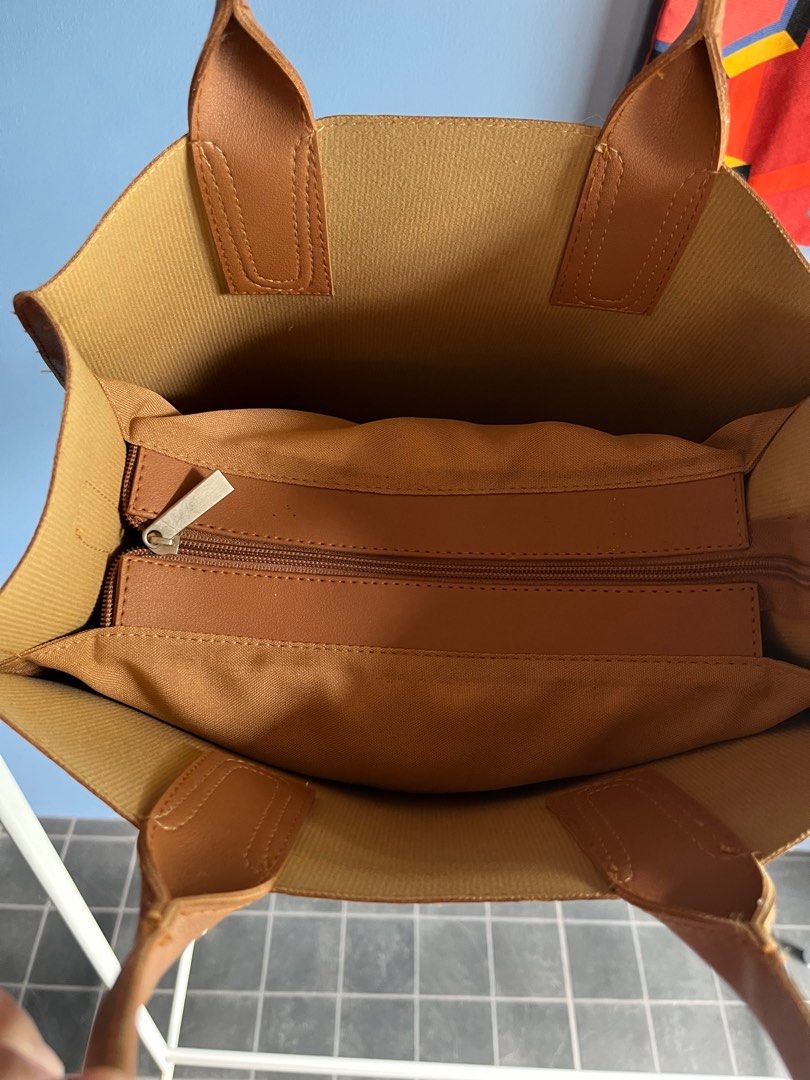 Everyday Office Bag (Category: Cross-body Bags) located in Quezon City. Submitted by isell. (Listing ID 1377037439, Image 3). Description: Big office bag, can fit files and everyday necessities. 3 main compartments with middle zipper. Can be used with or w/o strap. .
