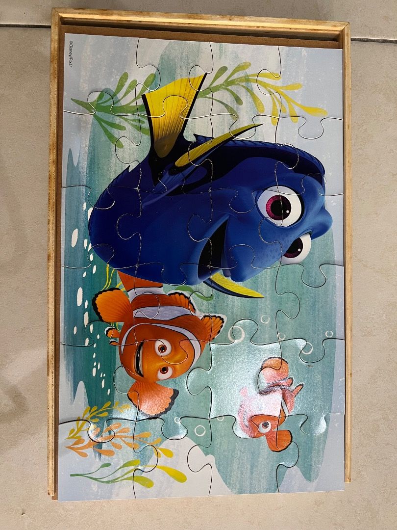 Finding Nemo (Category: Board Games & Puzzles) located in Puchong. Submitted by tyhan8089116 (Listing ID 1377112061, Image 2). Description: 7 sets of puzzle ranges from 12pcs to 24pcs come with a wooden box for storage.
