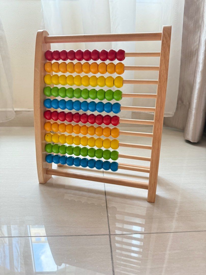Hape Wooden Toy Rainbow Bead Abacus (Category: Infant Playtime) located in Singapore. Submitted by babymantou (Listing ID 1377067934, Image 1). Description: Good condition wooden toy. Self collect at address below or arrange ur own courier..