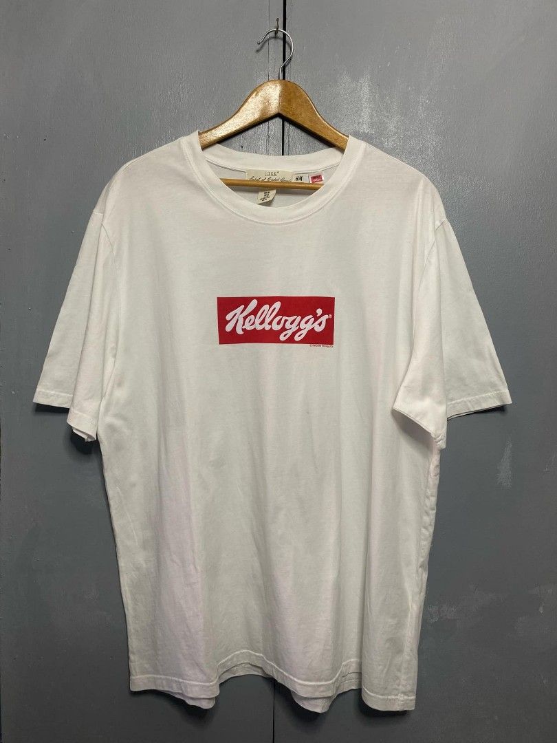 H&M L. O. G. G x Kelloggs (Category: Tshirts & Polo Shirts ) located in Las Pinas. Submitted by picknthrift (Listing ID 1377048480, Image 1). Description: Brand: H&M Label Of Graded Goods H&M L. O. G. G x Kelloggs Color: White Issue: None Condition: Excellent Coloration: 9.9/10 Size on Tag: XL Width x Heigth: 25" x 30. 5" - Mine: 1,290 php 📩📩📩 + Shipping Fee - 📌 Location: Las Piñas City 📌 MOP: G CASH 📌 No Refund, No Return Ask for Details �