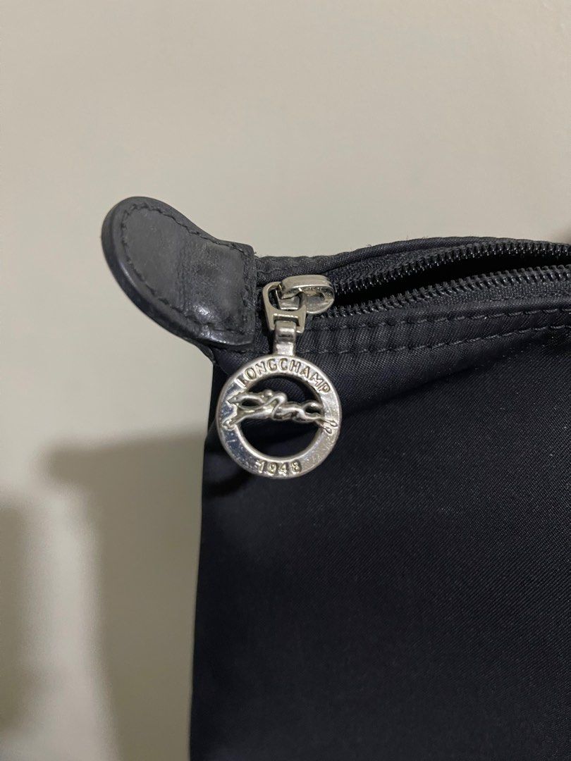 Longchamp Medium Short handle (Category: Shoulder Bags) located in Taguig. Submitted by ky_declutterss (Listing ID 1377143698, Image 3). Description: FOR SALE: Longchamp MSH Black - Original - In good condition, just a small white stain (please swipe through the photos) - SLIGHTLY NEGOTIABLE. Will ignore lowballers. RFS: i dont use it anymore MOP: BDO/GCASH MOD: Lalamove/GGX.