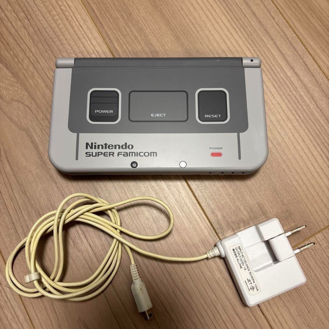 Nintendo 3DS LL Super Famicom Edition (Category: Nintendo) located in Manila. Submitted by japan_treasure (Listing ID 1377081498, Image 1). Description: This is the Super Famicom model of the 3DS LL. I put the cover on and used it a few times. There is one small scratch on the part exposed from the cover, and several other scratches that inevitably occur when opening and closing. Contents: Main unit, AC adapter No box. I will include a few softwa