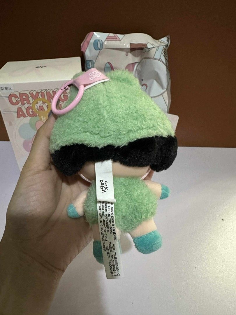 POPMART Crybaby What A Frog (Category: Designer & Blind Box Toys) located in Mandaluyong City. Submitted by coolpalmal (Listing ID 1377017620, Image 3). Description: 💚 crybaby crying again, what a frog - P900 - negotiable! - with box, foil, card - in good condition; no flaws - used as a bag charm outside only 2 times see shipping details below (shipping only!).