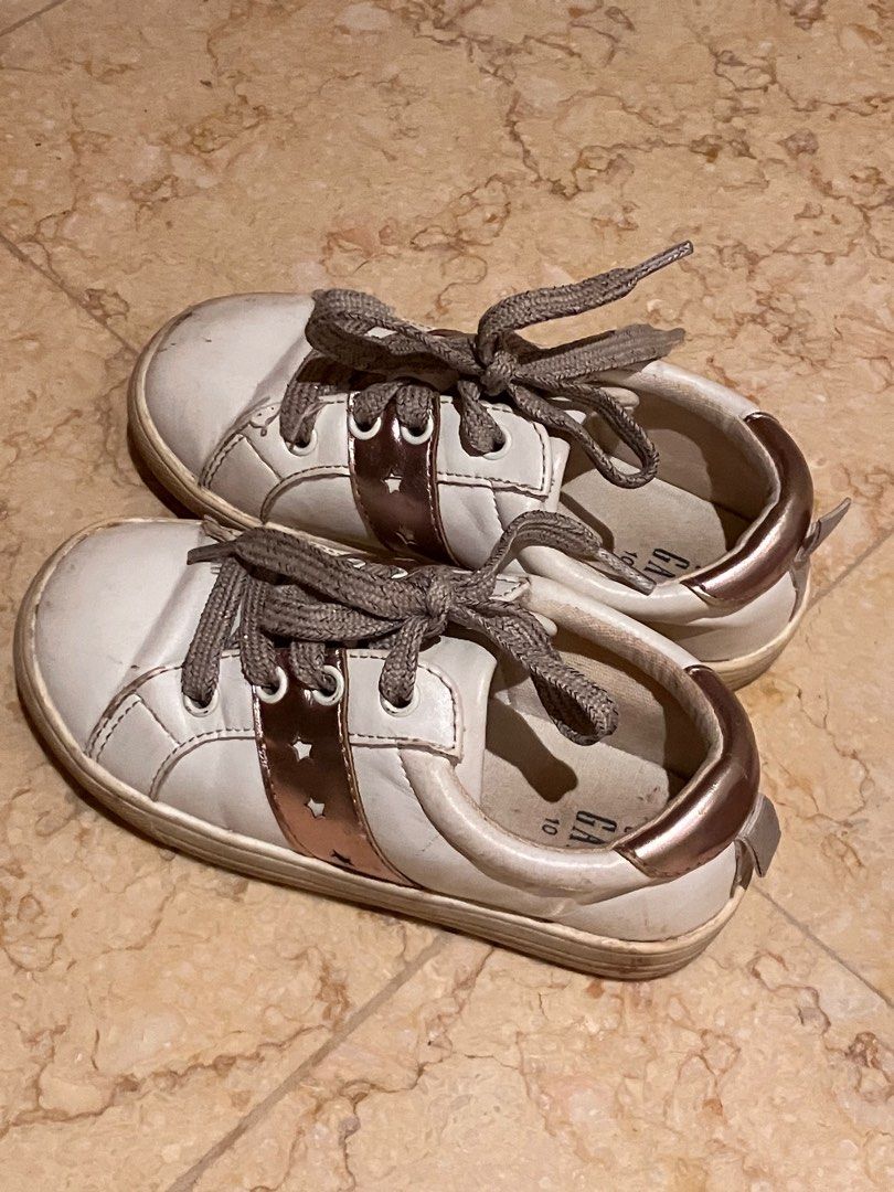Preloved Branded Girls Shoes (Gap, Clarks,Skechers, Nike, Next, Zaqy, H&M) (Category: Babies & Kids Fashion) located in Singapore. Submitted by homeclearance712 (Listing ID 1377131187, Image 2). Description: Preloved Girls Shoes from reputable brands $12 each If getting more than 2, $10 each Self pick up In order of pics: #2: GAP Girls lace up sneakers - rose gold details - rose gold metallic threading on laces - size US 10 - used condition #3: Z