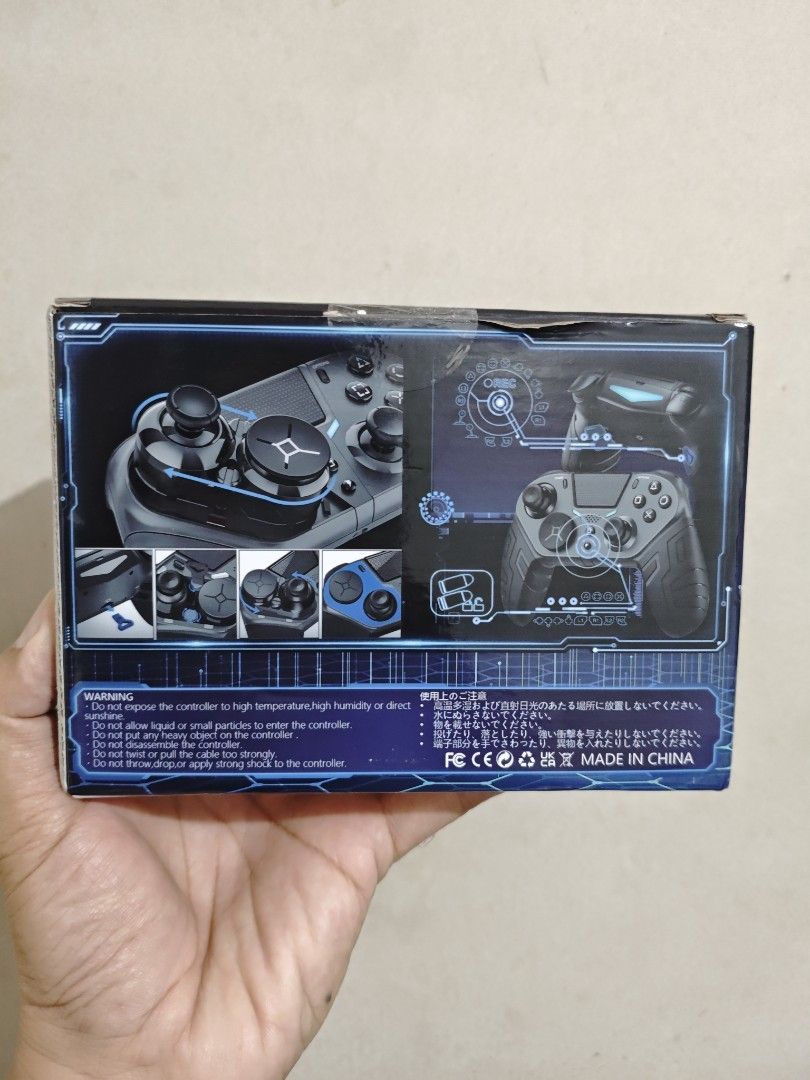 Q300 bluetooth controller (Category: Controllers) located in Quezon City. Submitted by unboxingtito (Listing ID 1377075257, Image 3). Description: Brand new and sealed..