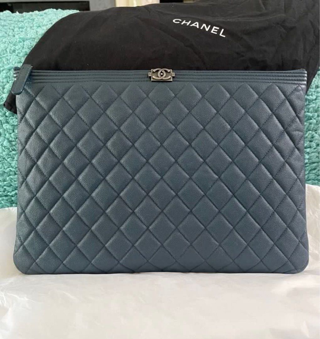 SALE! Authentic Chanel Boy O Case Clutch LARGE (Category: Bags & Wallets) located in Singapore. Submitted by maisondetaliab (Listing ID 1377136784, Image 1). Description: Sale! Comes with dustbag only Guaranteed authentic with hologram sticker No authenticity card No receipt .