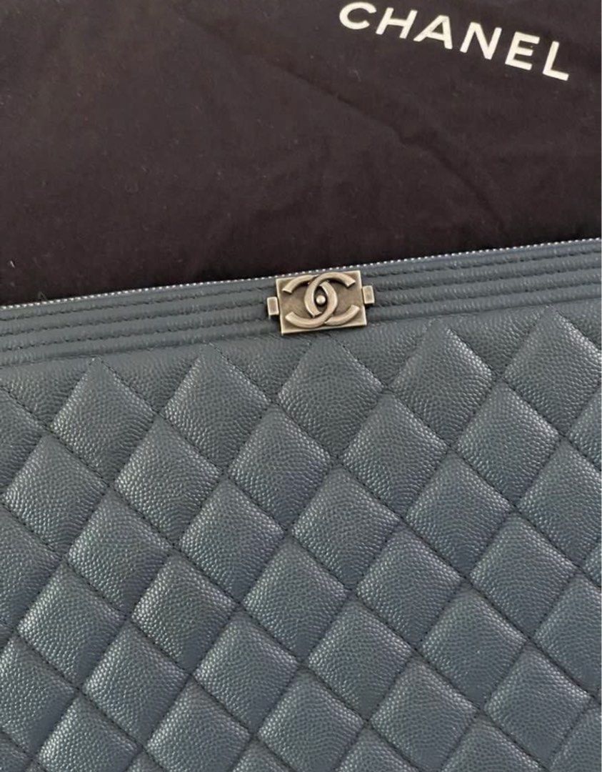 SALE! Authentic Chanel Boy O Case Clutch LARGE (Category: Bags & Wallets) located in Singapore. Submitted by maisondetaliab (Listing ID 1377136784, Image 2). Description: Sale! Comes with dustbag only Guaranteed authentic with hologram sticker No authenticity card No receipt .