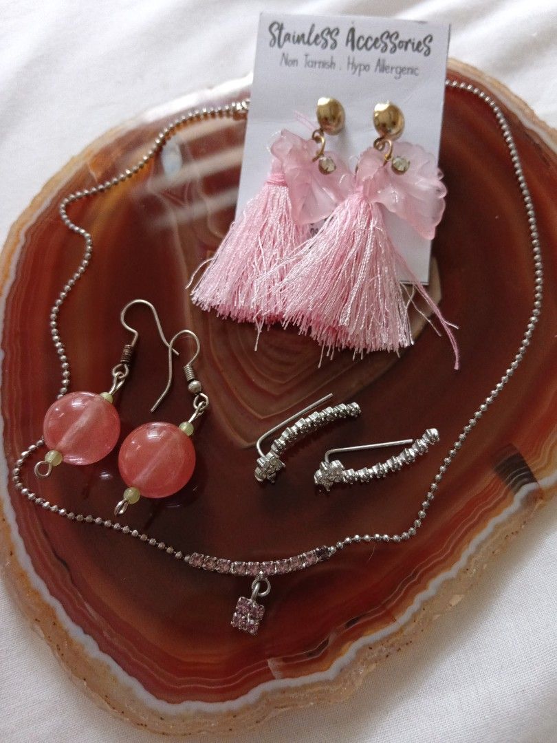 Set #12 ( 199 only ) Fashion Accessories (Category: Earrings) located in Manila. Submitted by harperoo (Listing ID 1377068145, Image 1). Description: * Set of Fashion Accessories for 199 only! -Necklace with pendant , 2 set of dangling earrings, 1 ear crawler * AS IS * Buyer pays the shipping fee. * Accept Bank transfer, Gcash payment. * JNT / LBC Courier * Grab / Lalamove delivery * Buy 2 sets or more ( FREE SHIPPING).