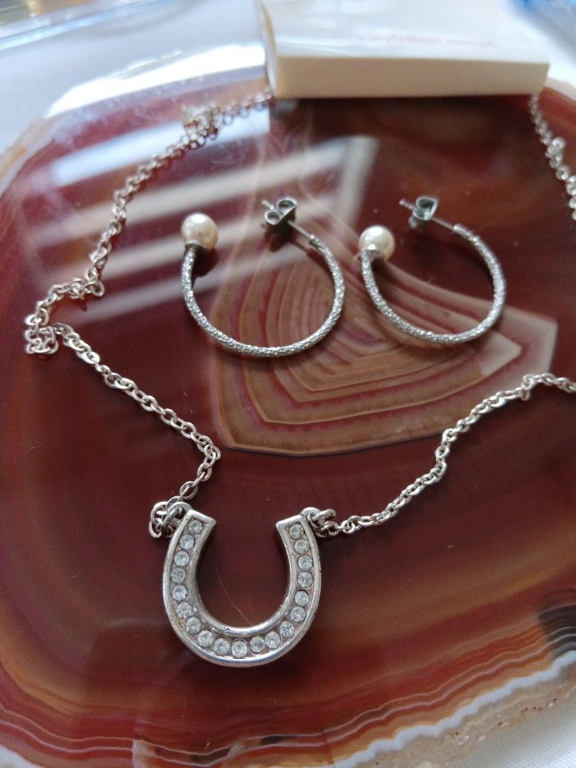 Set # 9 ( 299 only ) Fashion Accessories (Category: Necklaces) located in Manila. Submitted by harperoo (Listing ID 1377062675, Image 2). Description: * Set of Fashion Accessories for 299 only! -Necklace with horseshoe pendant , Round earrings with pearl * AS IS * Buyer pays the shipping fee. * Accept Bank transfer, Gcash payment. * JNT / LBC Courier * Grab / Lalamove delivery * Buy 2 sets or more ( FREE SHIPPING).