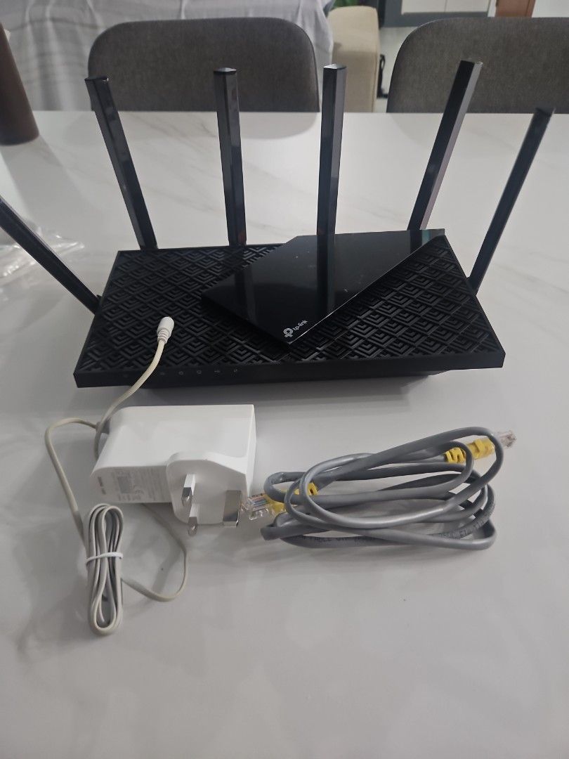 TP Link Archer AX72 AX5400 Dual-Band Gigabit Wi-Fi 6 Router (Category: Networking) located in Singapore. Submitted by kerosellll (Listing ID 1377162481, Image 2). Description: - Archer AX72 AX5400 Dual-Band Gigabit Wi-Fi 6 Router - Excellent condition and fully functional. - Includes router, power adapter, and ethernet cable. - Provides fast and reliable Wi-Fi coverage. - Ideal for home or small office use..