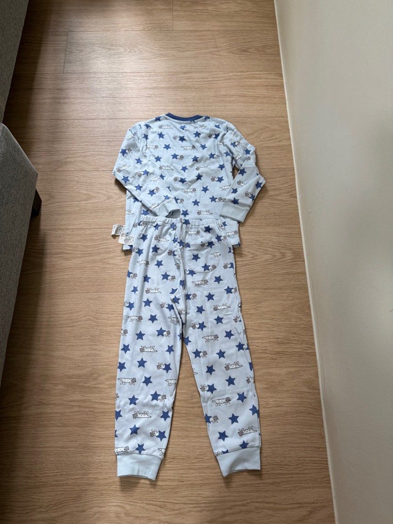 Uniqlo Baby Lisa Larson Pajama Set - Size 110 (Category: Babies & Kids Fashion) located in Singapore. Submitted by cty.closet (Listing ID 1377055851, Image 3). Description: Brand new Uniqlo Baby pajama set featuring a cute Lisa Larson cat and star print. Size 110. Made of 100% cotton. Comes in original packaging. Top up $2 for postage .