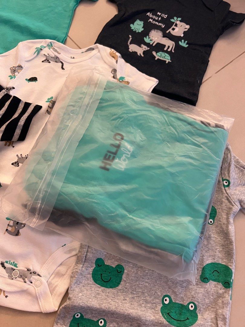 18M onesies x5 (Category: Babies & Kids Fashion) located in Singapore. Submitted by londistudio.com (Listing ID 1377204921, Image 2). Description: i accidentally checked out 2 sets. donating to someone else.