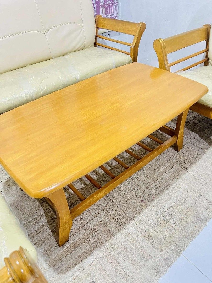 A Wooden Couch Sofa Set (Category: Sofas) located in Valenzuela. Submitted by jenelyn6 (Listing ID 1377324886, Image 2). Description: Sale❗❗❗ A Wooden Couch Sofa Set in German Leather pads, 3-1-1 Seater with Center Table. In very gppd condition. Solid teakwood made. Details: 3seater: L:68 xW:28 xH:32inches Solo seater: W:31 xDepth:28 xH:32inches Center Table: L:41 xW:23 xH:18inches 25k php ➕ delivery charge fee.