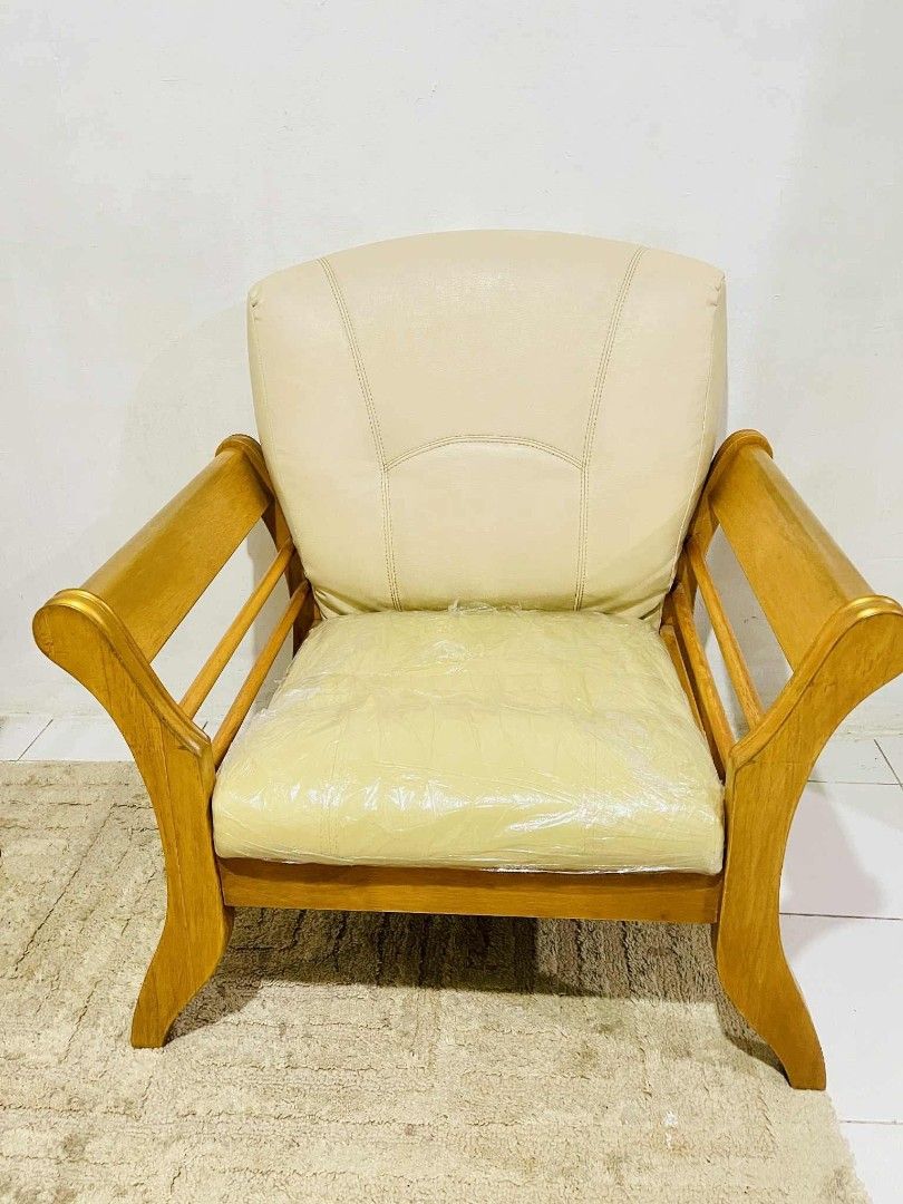 A Wooden Couch Sofa Set (Category: Sofas) located in Valenzuela. Submitted by jenelyn6 (Listing ID 1377324886, Image 3). Description: Sale❗❗❗ A Wooden Couch Sofa Set in German Leather pads, 3-1-1 Seater with Center Table. In very gppd condition. Solid teakwood made. Details: 3seater: L:68 xW:28 xH:32inches Solo seater: W:31 xDepth:28 xH:32inches Center Table: L:41 xW:23 xH:18inches 25k php ➕ delivery charge fee.