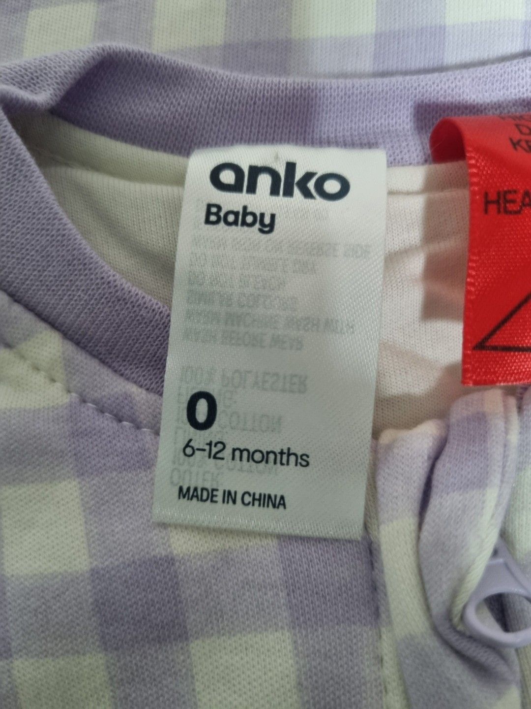 Anko Baby Sleep Sack - 6-12 Months (Category: Babies & Kids Fashion) located in Singapore. Submitted by Mibee (Listing ID 1377334986, Image 2). Description: This Anko baby sleep sack is perfect for keeping your little one cozy and safe. It features a convenient zipper and a charming purple gingham pattern. Suitable for babies aged 6-12 months. Ideal if you're visiting a cold country as it's thick. Bought in Australia, for their winter. Brand new,