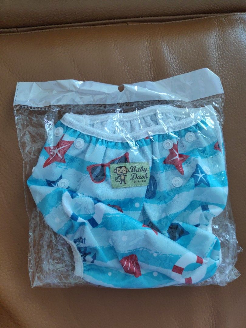 Baby Dash Cloth Diaper - Nautical Theme (Category: Diapers & Baby Wipes) located in Singapore. Submitted by sweetcorn (Listing ID 1377243970, Image 1). Description: - Brand new Baby Dash cloth diaper - Fun nautical theme - Snap closures for easy adjustment - Comes in original packaging - Perfect for eco-conscious parents! - Suitable for 3-15kg.
