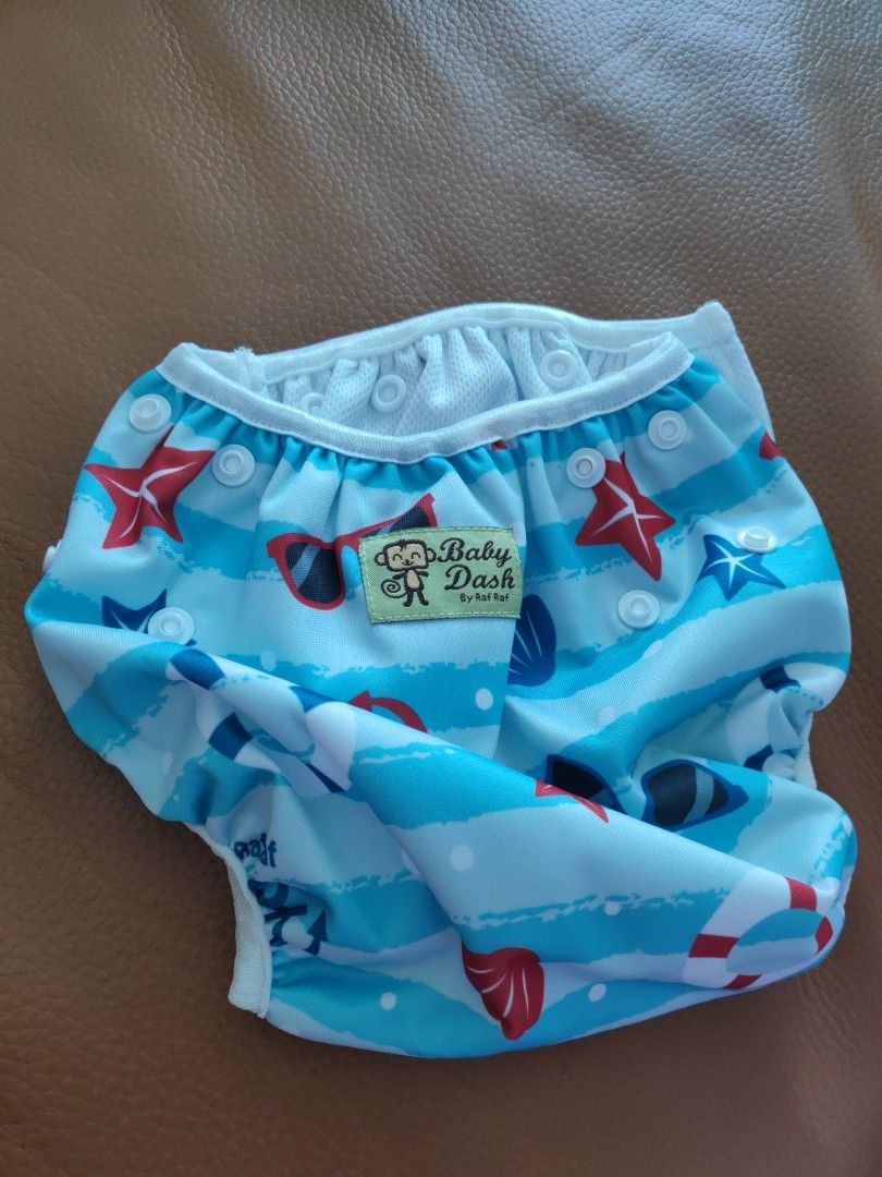 Baby Dash Cloth Diaper - Nautical Theme (Category: Diapers & Baby Wipes) located in Singapore. Submitted by sweetcorn (Listing ID 1377243970, Image 3). Description: - Brand new Baby Dash cloth diaper - Fun nautical theme - Snap closures for easy adjustment - Comes in original packaging - Perfect for eco-conscious parents! - Suitable for 3-15kg.