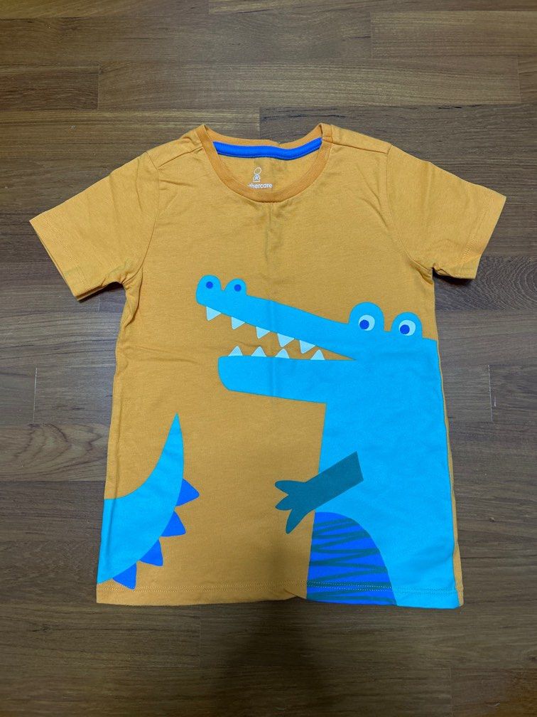 BNWOT Mothercare Kids Orange Tee Shirt Crocodile Print 4-5yo (Category: Babies & Kids Fashion) located in Singapore. Submitted by berry7878 (Listing ID 1377322200, Image 1). Description: 4-5yo Up to 110cm.