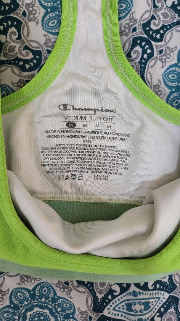 Champion Neon Sports Bra (Category: Activewear) located in Quezon City. Submitted by ag_2016 (Listing ID 1377348413, Image 2). Description: DECLUTTERING Excellent Quality Never Been Used Was Given to me Size: S - M Loc: Fairview.