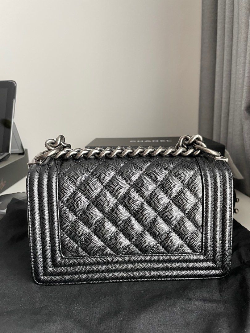 Chanel Boy Bag small - Black Caviar Leather (Category: Bags & Wallets) located in Singapore. Submitted by dazhuzhu (Listing ID 1377244823, Image 2). Description: Beautiful Chanel Boy Bag in black caviar leather. Features a classic quilted design with black ruthenium hardware. Comes with original box, dust bag, and authenticity card. Excellent condition, barely used. Microchip Full set with receipt, box, paper bag etc Still under 5 years warranty 