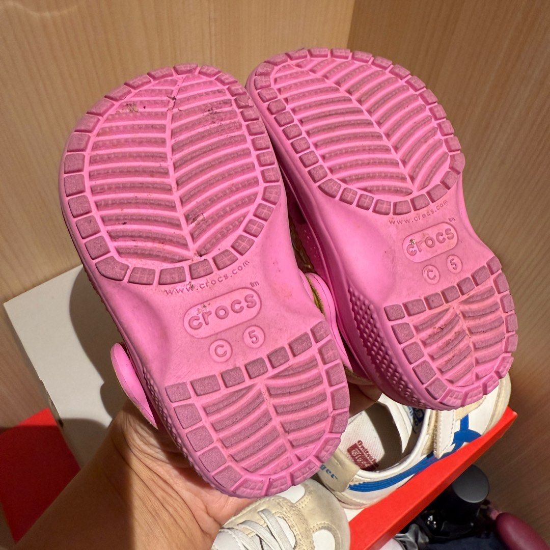 Crocs Disney Princess Clogs - Size C5 (Category: Babies & Kids Fashion) located in Singapore. Submitted by robinsparkless (Listing ID 1377316901, Image 3). Description: Authentic Crocs clogs featuring a Disney Princess theme. Size C5. Pink in color. Lightly used, with some wear on the soles. Includes the original Disney Princess jibbitz. Perfect for any little princess!.