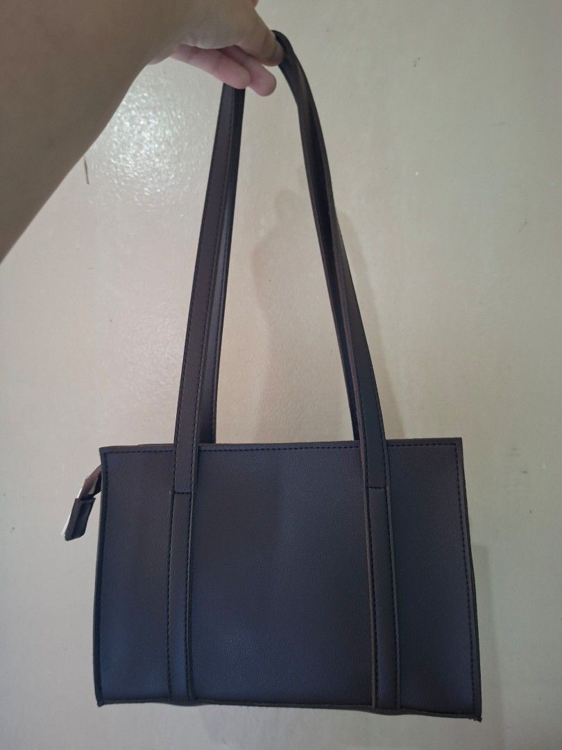 Daily Carry Micro Shoulder Bag (Category: Shoulder Bags) located in Manila. Submitted by declutterthingz30 (Listing ID 1377140336, Image 2). Description: LAST PRICE ALREADY color brown good as new used 2 or 3 times only.