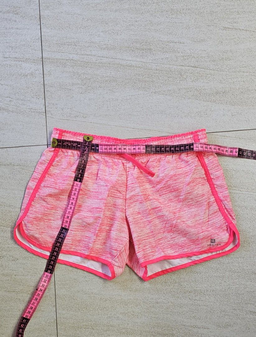 Decathlon Girl Shorts (Category: Babies & Kids Fashion) located in Singapore. Submitted by 11mimi (Listing ID 1377301811, Image 2). Description: Bought but didn't wear. I have 2 pairs of the orange and colourful designs shorts..