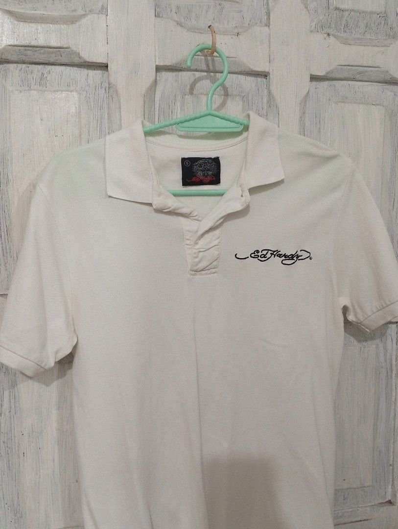 ED HARDY WHITE POLO SHIRT (Category: Tshirts & Polo Shirts ) located in Caloocan City. Submitted by llen. (Listing ID 1377224184, Image 3). Description: SIZE S LOCATION: NORTH CAL, QC.