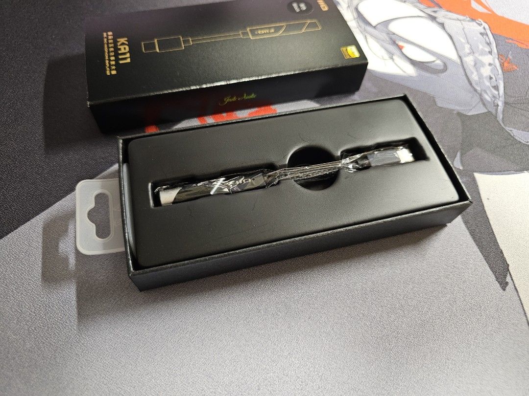 FiiO KA11 USB C DAC AMP Black (Category: Portable Audio Accessories) located in Singapore. Submitted by tnhwei (Listing ID 1377340806, Image 3). Description: Like new FiiO KA11 USB C DAC Headphone/Earphone Amplifier. No scratches and scuffs as I have never brought it outside. Comes with original box. This is a compact and portable but very powerful amp that can drive hard to drive headphones. It can enhance audio quality for your headphones or ie