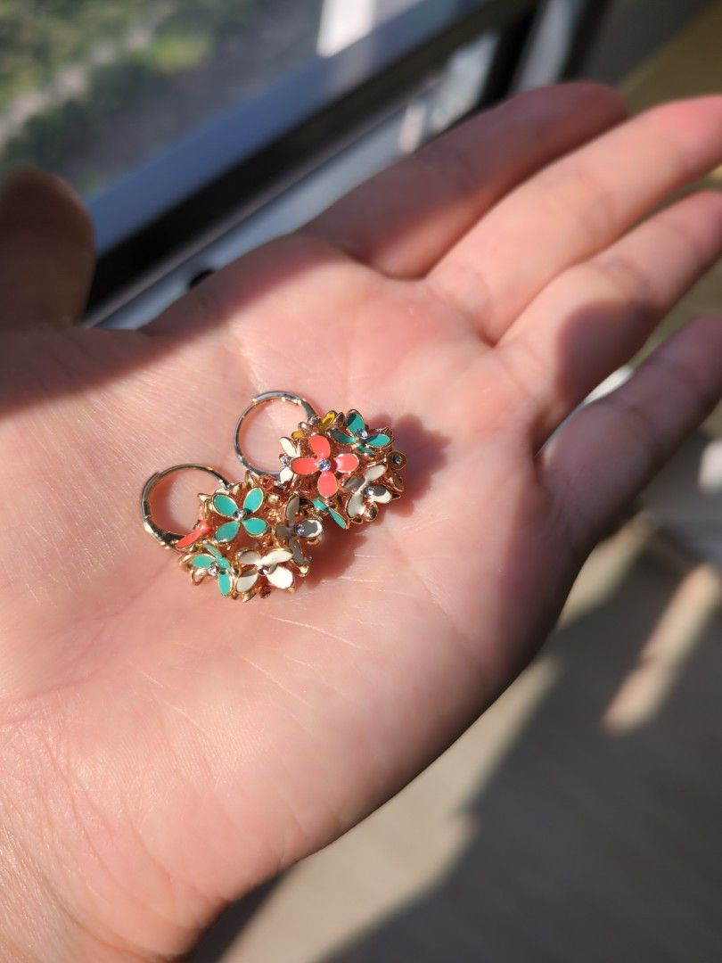 Floral Hoop Dangle Earrings - multi-coloured enamel (Category: Earrings) located in Singapore. Submitted by butterwaffles (Listing ID 1377277826, Image 3). Description: - Beautiful floral hoop earrings that dangle very prettily on the ear - Colourful flower details in enamel (colour won't wear away) - Well-made and very good quality - Adds a touch of whimsy to any outfit.